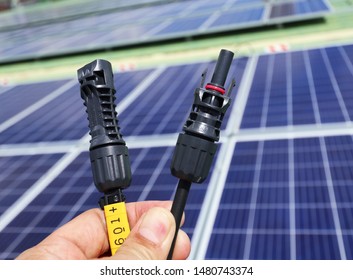 Solar PV Connectors Male And Female Hand Holding