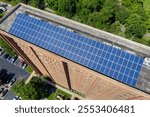 Solar rooftop on apartment condo building in Nashville, Tennessee. Production of clean ecological electrical energy. Renewable electricity with zero emission