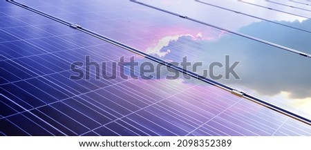 Solar rooftop with reflection of the sun and cloud, soft and selective focus.