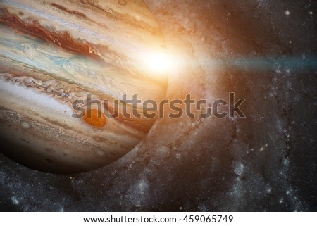 Solar System - Jupiter. It is the fifth planet from the Sun and the largest in the Solar System. Its a giant planet with a mass one-thousandth that of the Sun. Elements of this image furnished by NASA