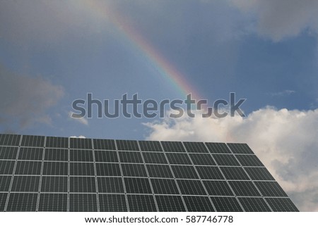 A solar system on a house roof under a rainbow Stock photo © 