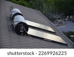 solar water geyser heaters on a roof in western cape