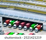 Solar-powered warehouse facility with freight trucks at loading docks. Eco-friendly logistics and efficient cargo transportation. Solar panels and sustainable energy concept in distribution center.