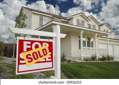 Sold Home For Sale Sign In Front Of New House