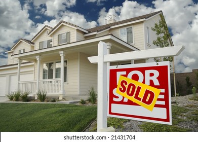 Sold Home For Sale Sign In Front Of New House