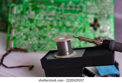 Soldering Iron On A Stand, Solder For Soldering Micro Elements. Microelectronics Repair , Jewelry Work