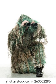 Soldier In Camouflage With Binoculars