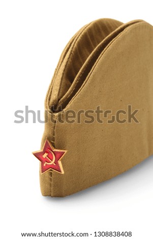 Soldier cap with a red Soviet star isolated on white