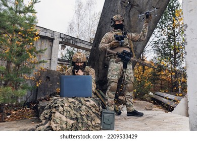 Soldier Engineer Is Preparing Reconnaissance Drone For Flight. Concept Military Use Of Quadrocopters.