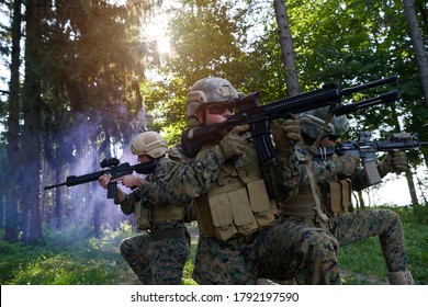 Soldier Fighters Standing Together With Guns. Group Portrait Of US Army Elite Members, Private Military Company Servicemen, Anti Terrorist Squad