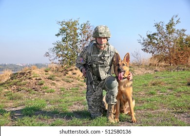 Soldier With German Shepherd Dog At Military Firing Range