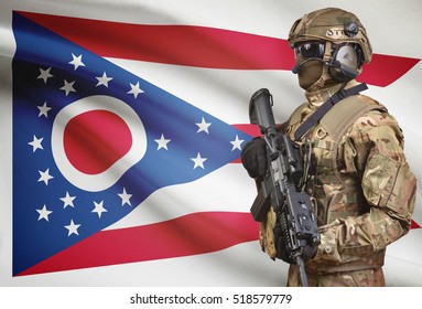 Soldier In Helmet Holding Machine Gun With USA State Flag On Background - Ohio