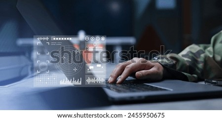 soldier man hand click on laptop to use program of radar and radio aviation for test system of tracking and defense at the dark control room center in monitor station for military technology concept