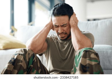 Soldier, man and stress, headache or PTSD of military trauma, remember pain and fear or scared on floor. Sad, frustrated and mental health of army or veteran person with depression or anxiety at home - Powered by Shutterstock