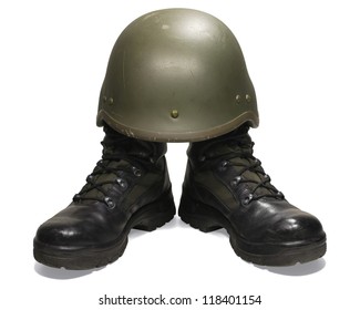 Soldier: military boots and helmet. Isolated on white background. Clipping path (without shadow). - Powered by Shutterstock
