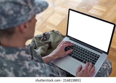 Soldier In Military Uniform Using High Tech Computer In Headquarters Intelligence Center