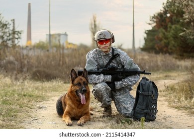 Soldier With Military Working Dog Outdoors