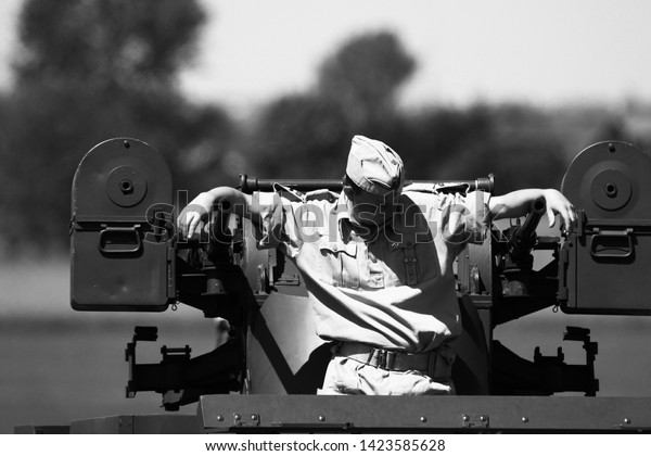 Świdnik,Poland-06.07.2019: A soldier from a\
reconstruction group standing in front of the M13\
truck.
