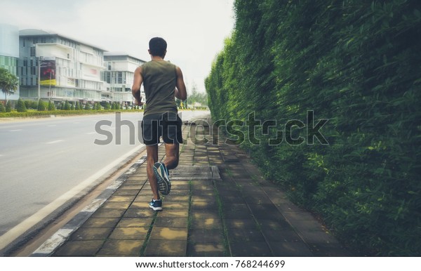 Soldier Running in a morning training session speed\
running focus \
