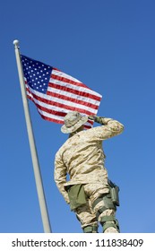Soldier Saluting An American flag