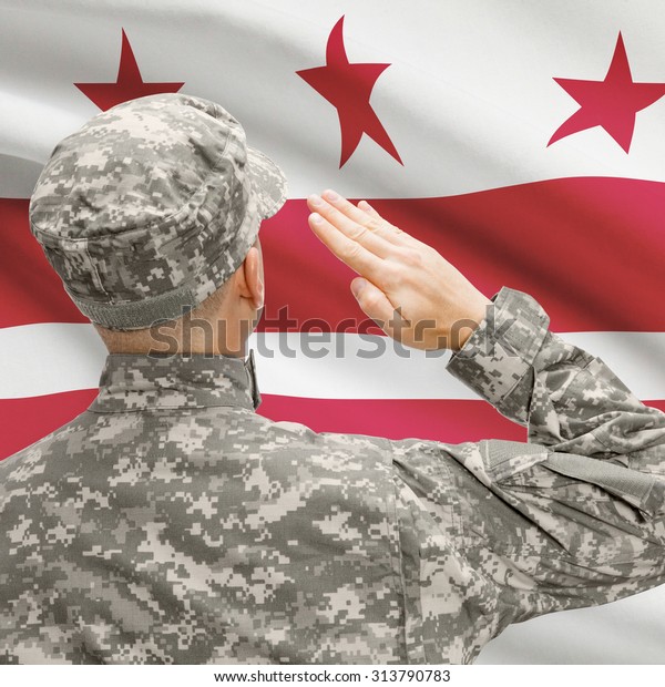 Soldier Saluting Usa State Flag Conceptual Stock Photo (Edit Now) 313790783