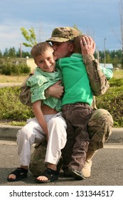 A Soldier Saying Goodbye To His Kids Before Deployment