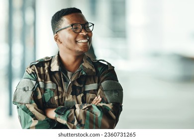 Soldier with smile, confidence and arms crossed at army building, pride and happy professional in sevice. Military career, security and courage, black man in camouflage uniform at government agency. - Shutterstock ID 2360731265