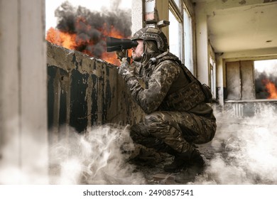 Soldier in uniform with binoculars inside abandoned building during military operation - Powered by Shutterstock