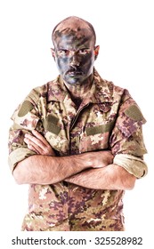 A Soldier Wearing Camouflage Clothing And Army Face Paint Isolated Over A White Background