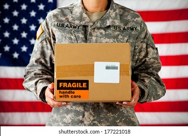 Soldier: Woman Holding A Package From Home