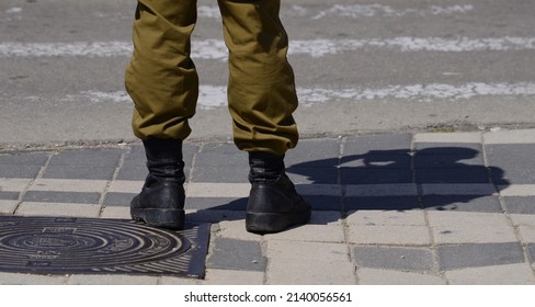 Soldier's boots on the feet of an Israeli soldier. Concept: Soldiers IDF - Israel Defense Forces (Tzahal), IsraelI soldiers, Israeli army