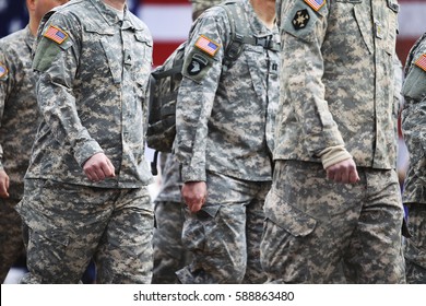 Soldiers Dressed In Army Camouflage In An Army Parade 