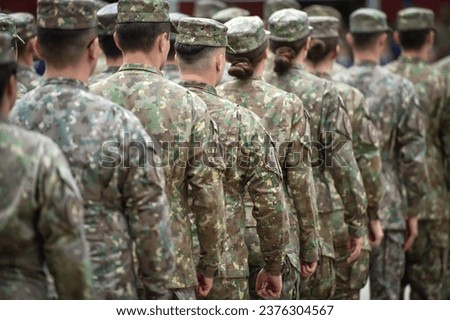 Soldiers in marching formation during military recruitment 