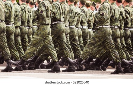 Soldiers Marching Training In The Army. Green Uniform