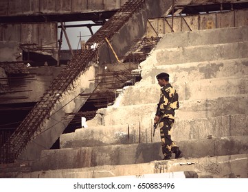 Soldiers Patrols The Area On A Destroyed Building. Pakistani Border, 22 January 2017.