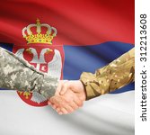 Soldiers shaking hands with flag on background - Serbia
