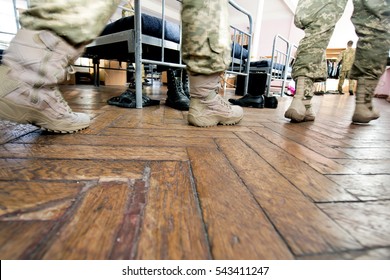 Soldiers In Uniform In The Military Barracks