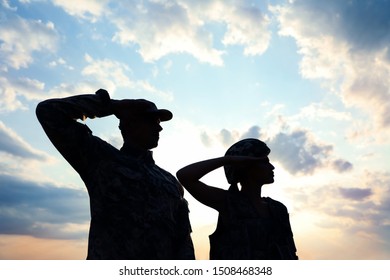 Soldiers In Uniform Saluting Outdoors. Military Service