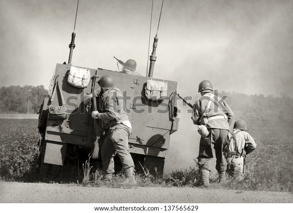 Soldiers in World War II era\
battle