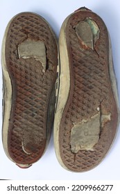 The Sole Of The Shoe Is Damaged And Has Holes. Old Shoes