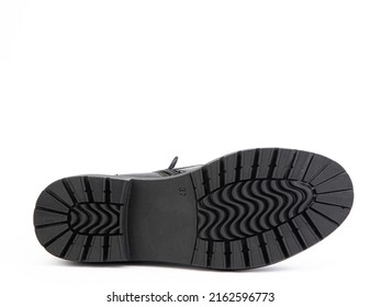 Sole for shoes, bottom view. Shoe sole close-up isolated on white background. place for text. Element of boots. Concept of production of shoe accessories.