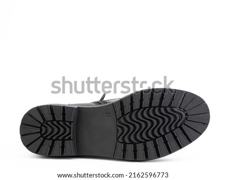 Sole for shoes, bottom view. Shoe sole close-up isolated on white background. place for text. Element of boots. Concept of production of shoe accessories.