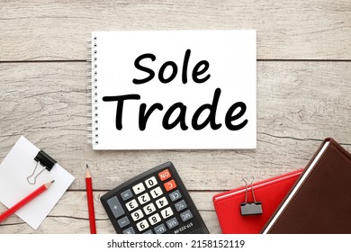 Sole Trader, Notebook On Table With Text Near Stationery