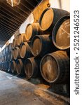 Solera systems in old Andalusian wine cellar, process for aging sherry wine in barrels, fino, manzanilla, olorosso, amontillado jerez fortified wine, Sanlucar de Barrameda, Cadiz, Andalusia, Spain