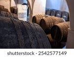 Solera systems in old Andalusian wine cellar, process for aging sherry wine in barrels, fino, manzanilla, olorosso, amontillado jerez fortified wine, Sanlucar de Barrameda, Cadiz, Andalusia, Spain