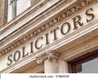 Solicitors Sign On A Office Building