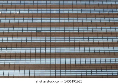 Solid background of the window of a large building on a flat wall