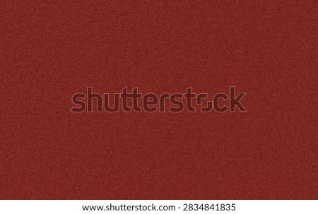 A solid dark red background with a fine, uniform grainy texture throughout the entire surface.