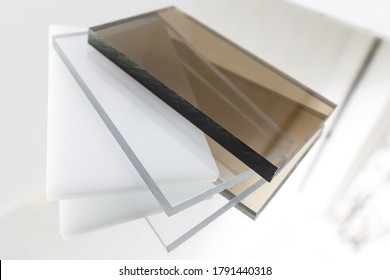 Solid Polycarbonate Sheet. Brown, White, Transparent. Acrylic Plastic Glass