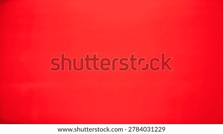 A solid red background with subtle texture, perfect for design projects, presentations, and creative concepts. This image provides a clean and visually appealing backdrop.